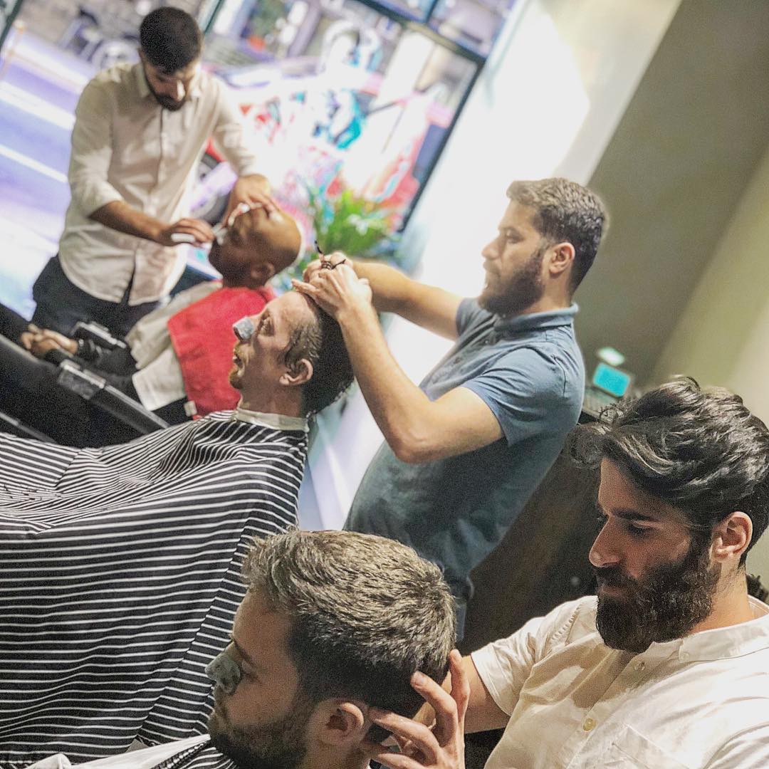 The three brothers, founders of Baba Barbers