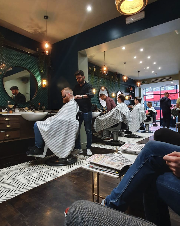 Barber working at Baba